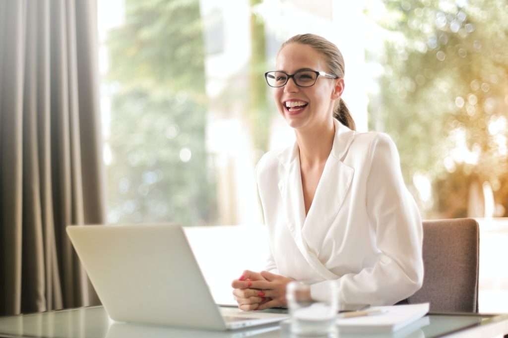 satisfied person using laptop