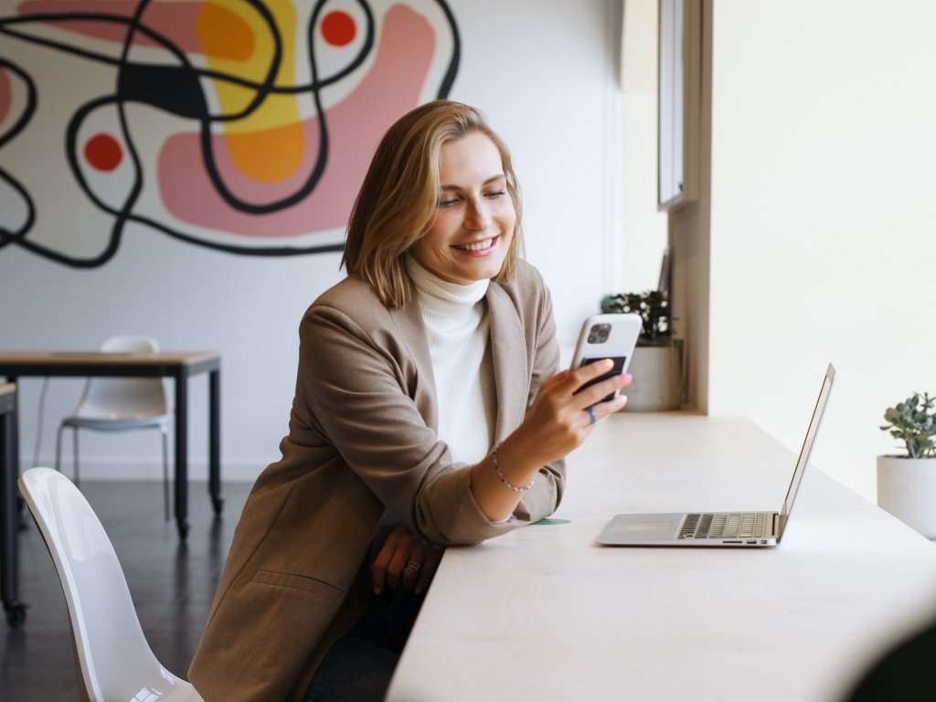 Woman on laptop working in marketing